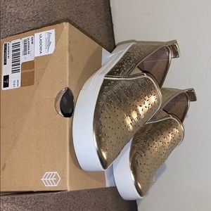 Gold flat loafers